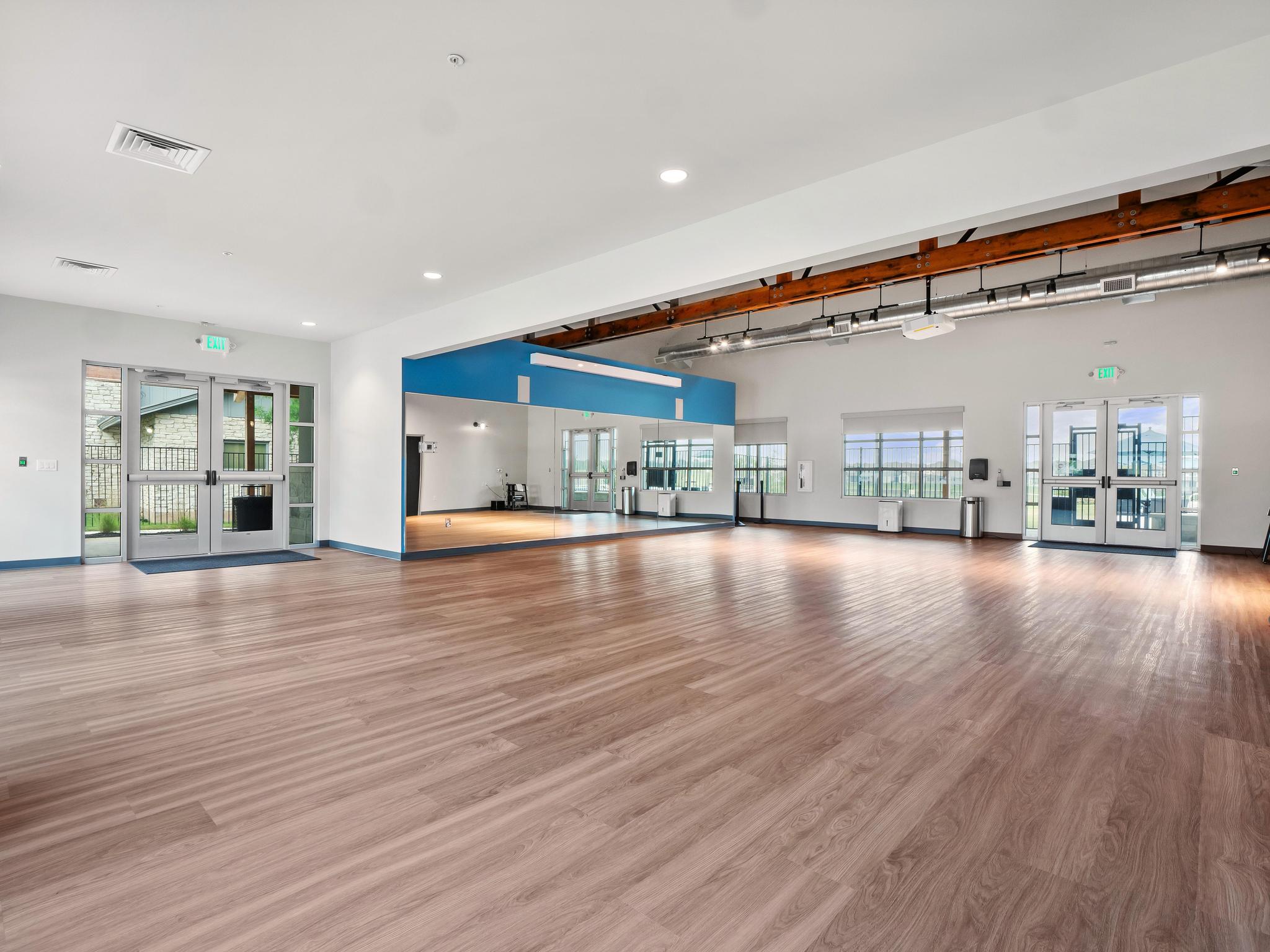 Carries Ranch Recreation Center studio with mirrored wall and open floor space.